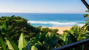 Zinkwazi Beach's quiet shoreline and lagoon mouth on the KwaZulu-Natal North Coast, seen from a beachfront holiday home
